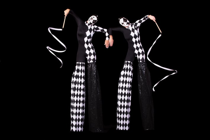 5 - Masked Harlequin on stilts 1