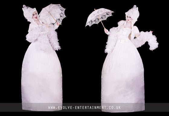 Enchanted Madame on Stilts Branded