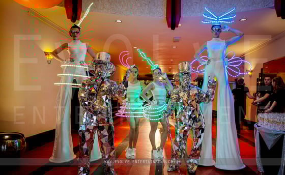 Group Mirror Men and LED Stilts LED Dancers meet and greet